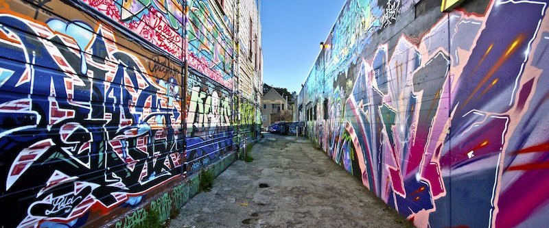 Grafitti on walls in an alley
