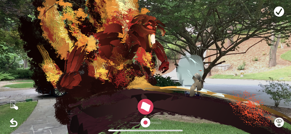 Fire creature rendered via AR in a park